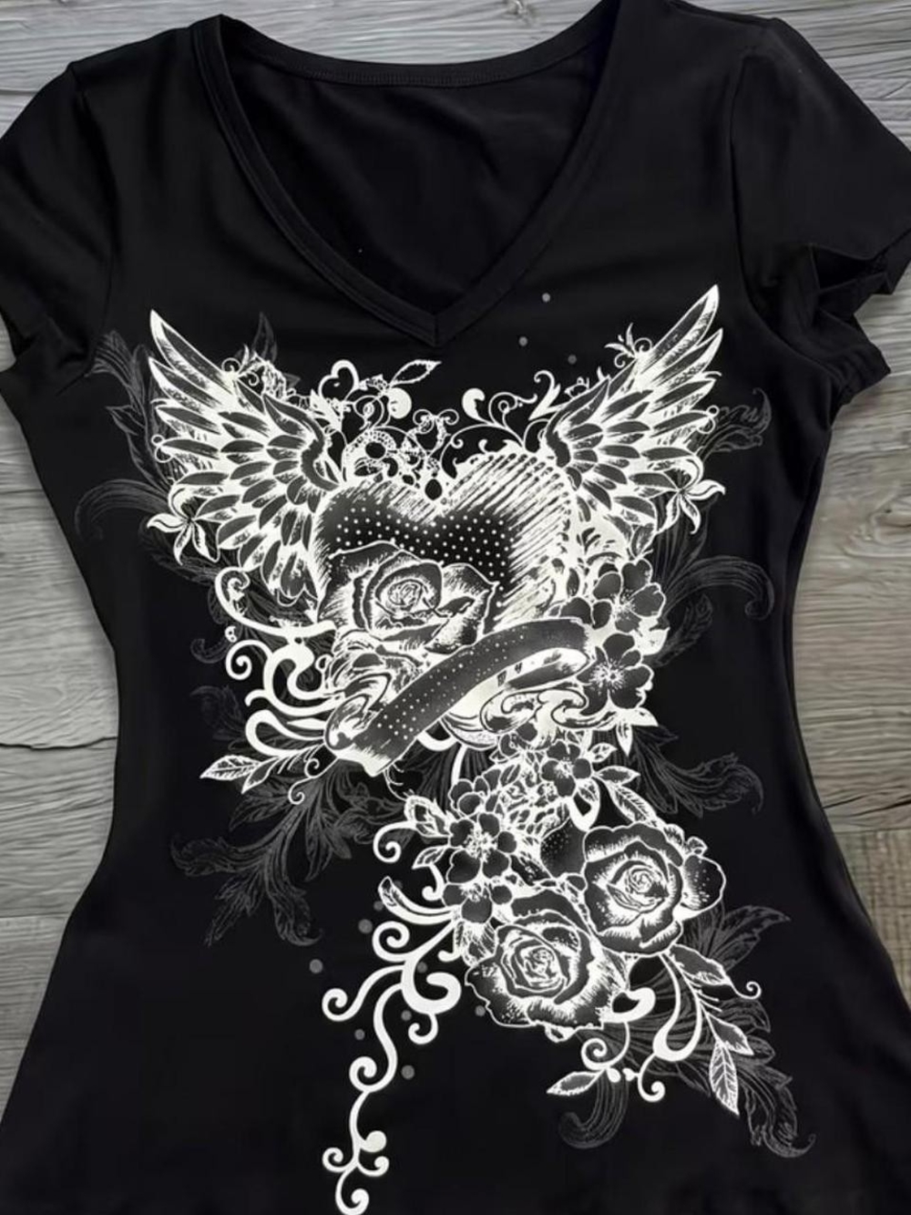 Black V-Neck Graphic Tee with Winged Heart and Rose Design